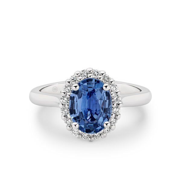 Oval Blue Sapphire and Diamond Halo Ring in 18K White Gold E1044